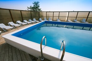 Alberca al aire libre por temporada