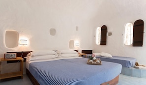 Standard Room (Dammuso) | Minibar, in-room safe, soundproofing, bed sheets
