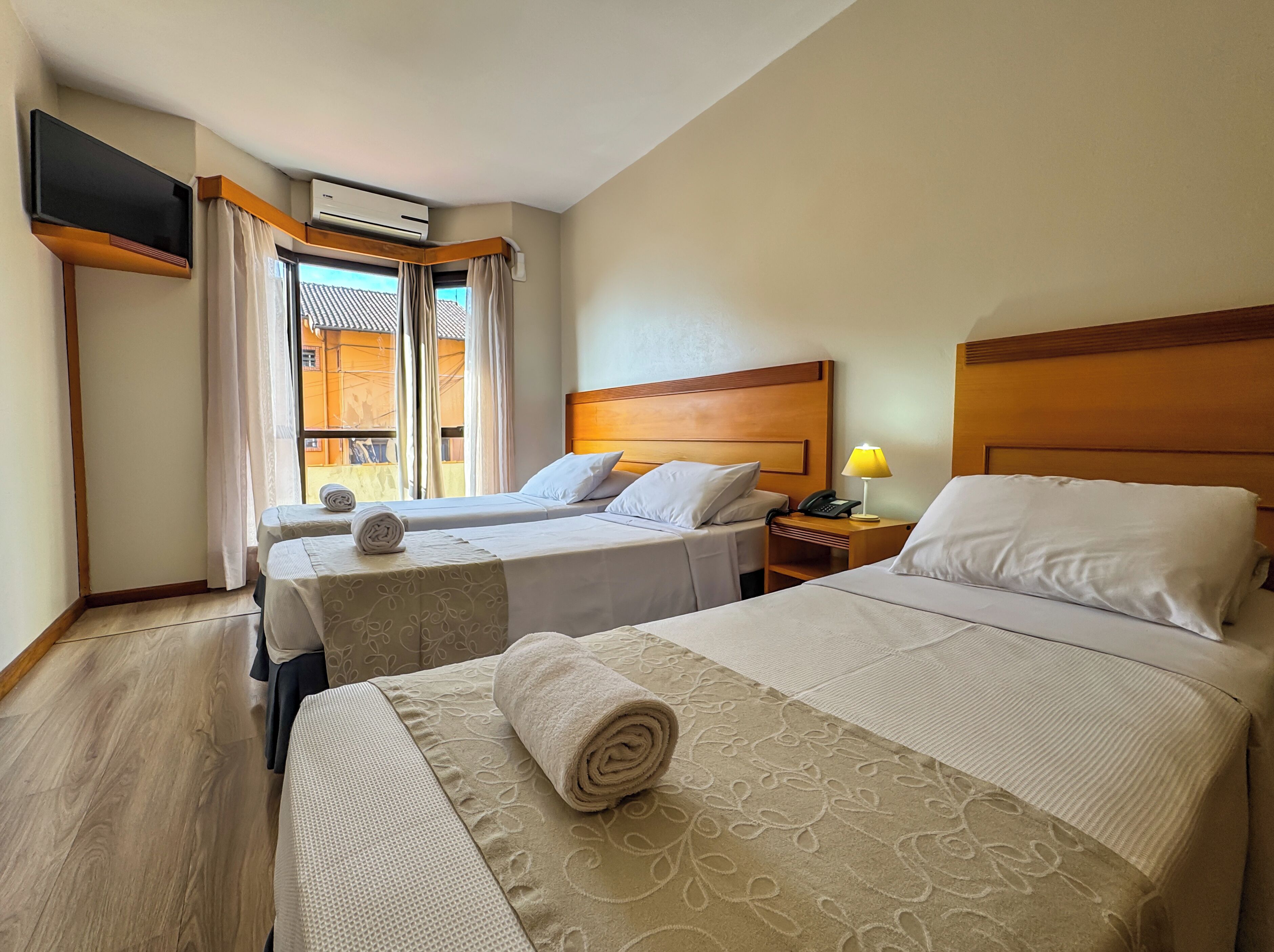 Deluxe Triple Room | Minibar, desk, blackout curtains, free WiFi