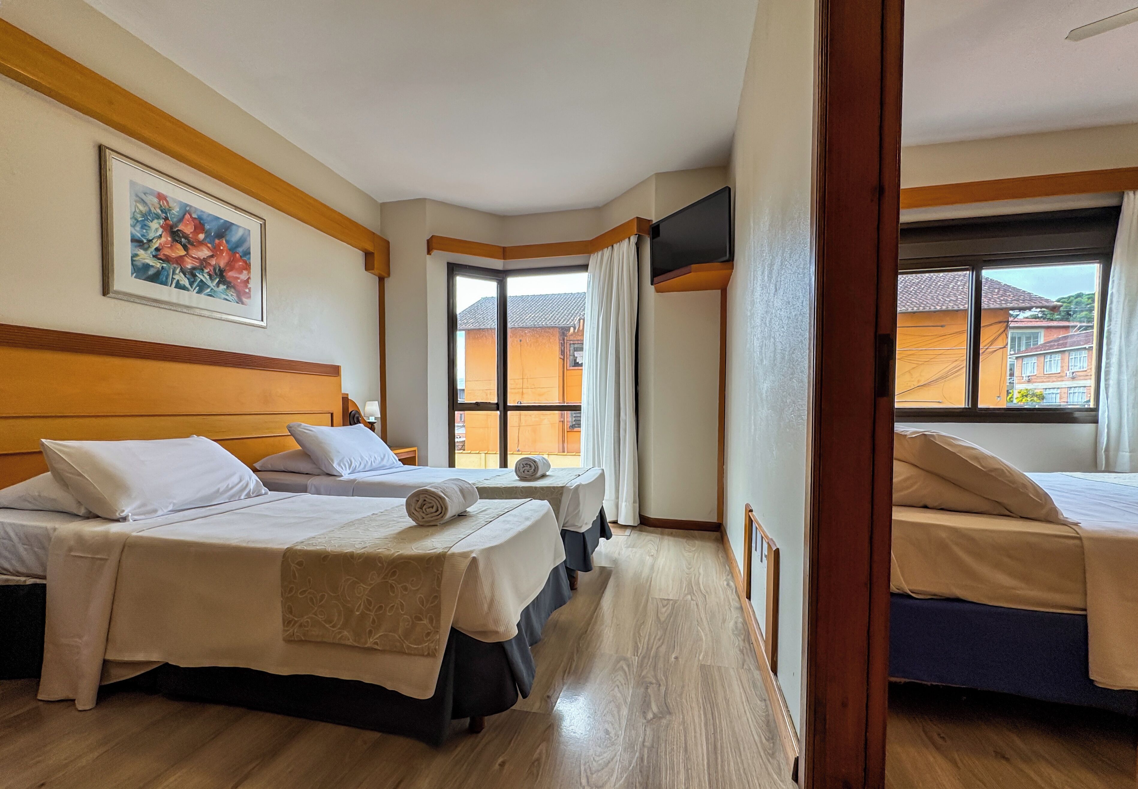 deluxe quadruple room | minibar, desk, blackout curtains, free wifi