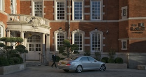 Experience the grandeur of The Laitt London, a historic building with a stately entrance and elegant facade.