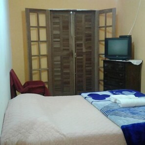 Premium bedding, blackout curtains, iron/ironing board, rollaway beds