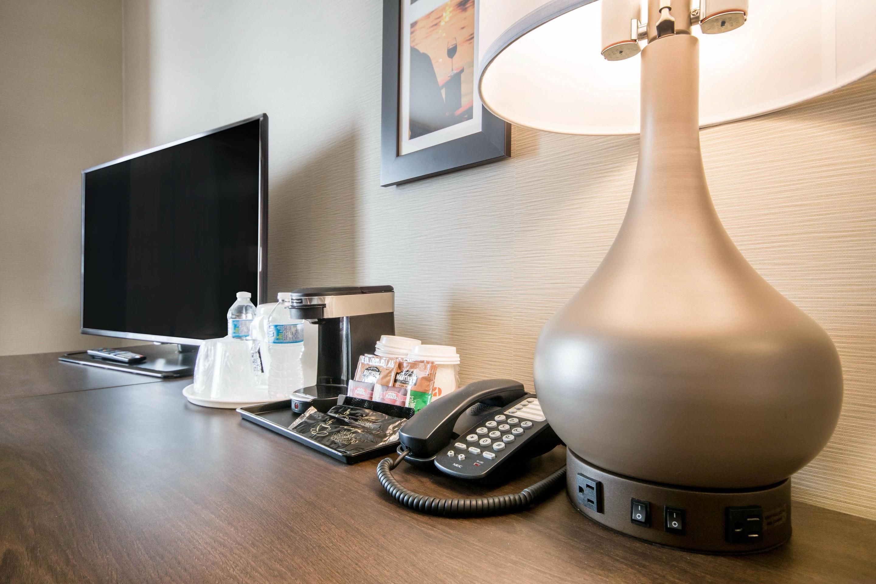 premium bedding, desk, laptop workspace, iron/ironing board