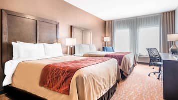 Premium bedding, desk, laptop workspace, iron/ironing board