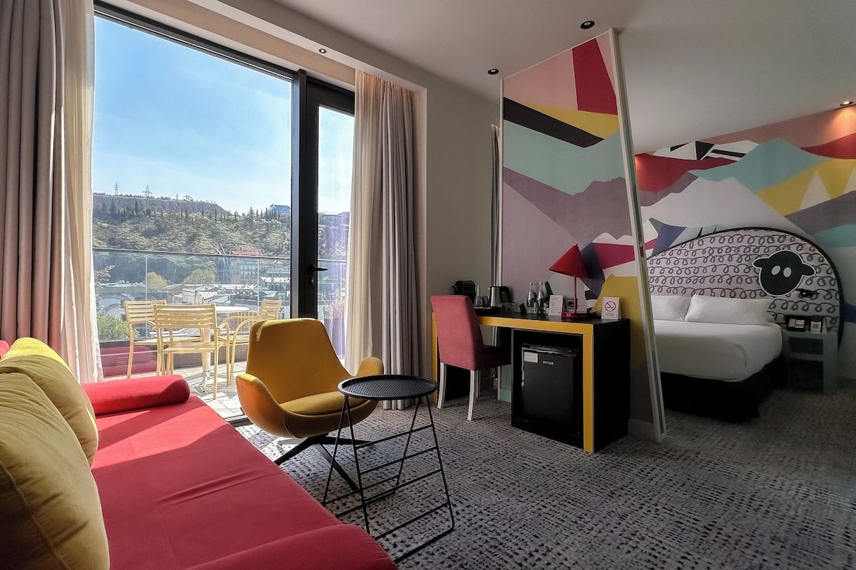 suite, balcony | 1 bedroom, premium bedding, minibar, in-room safe