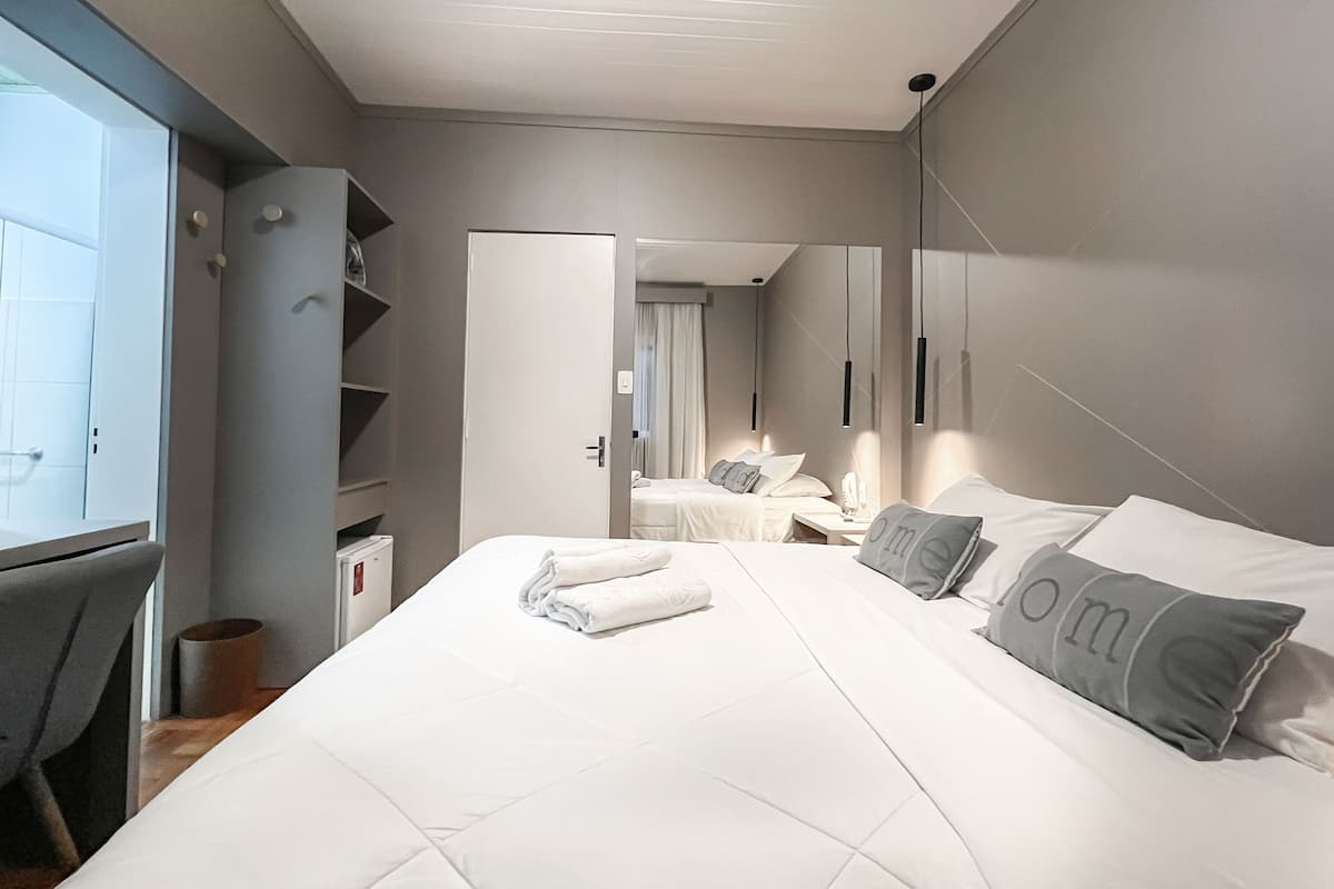 Minibar, desk, blackout drapes, iron/ironing board