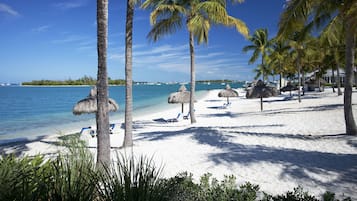 Private beach, white sand, free beach cabanas, sun loungers