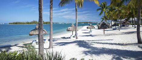 Private beach, white sand, free beach cabanas, sun-loungers