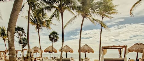 Private beach, white sand, free beach cabanas, sun-loungers