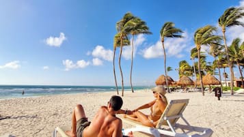 Private beach, white sand, free beach cabanas, sun-loungers