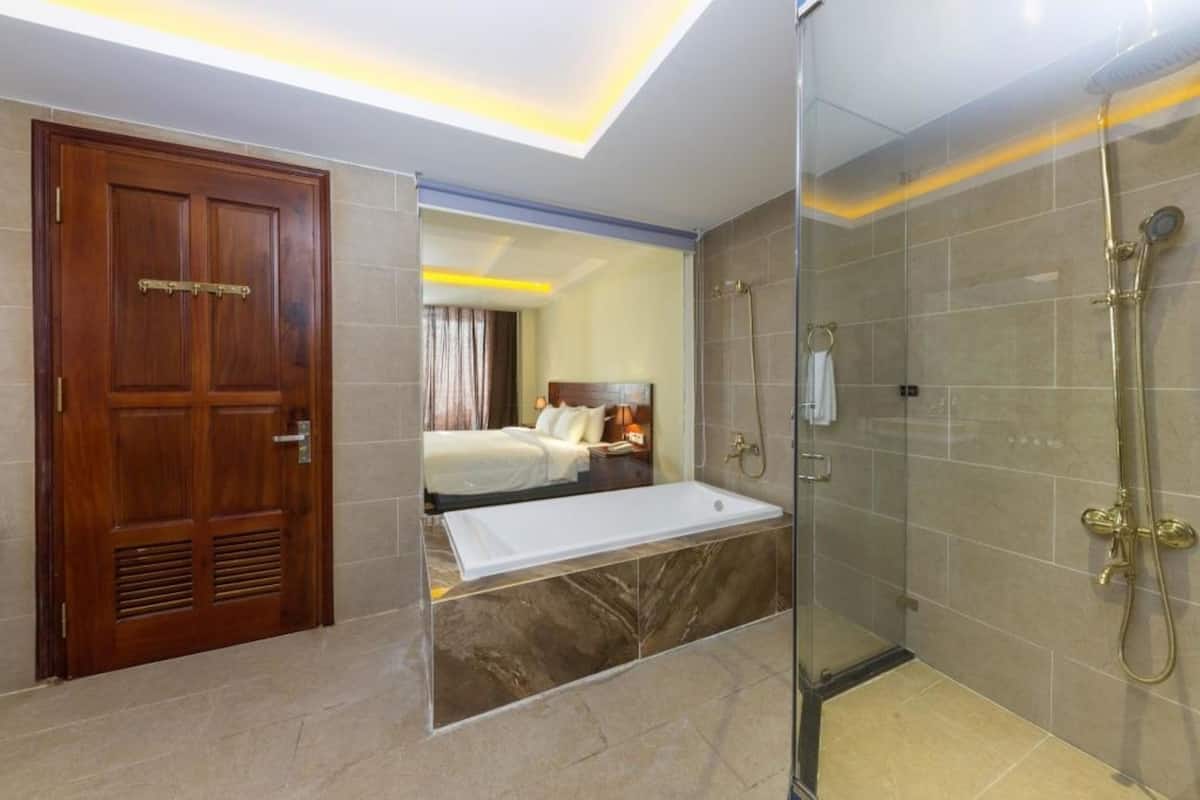 amarin suite | bathroom | shower, free toiletries, hair dryer, bathrobes