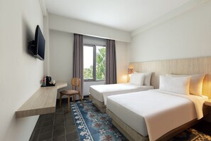 Premium bedding, desk, blackout curtains, free WiFi - Burza Hotel Yogyakarta (Yogyakarta)