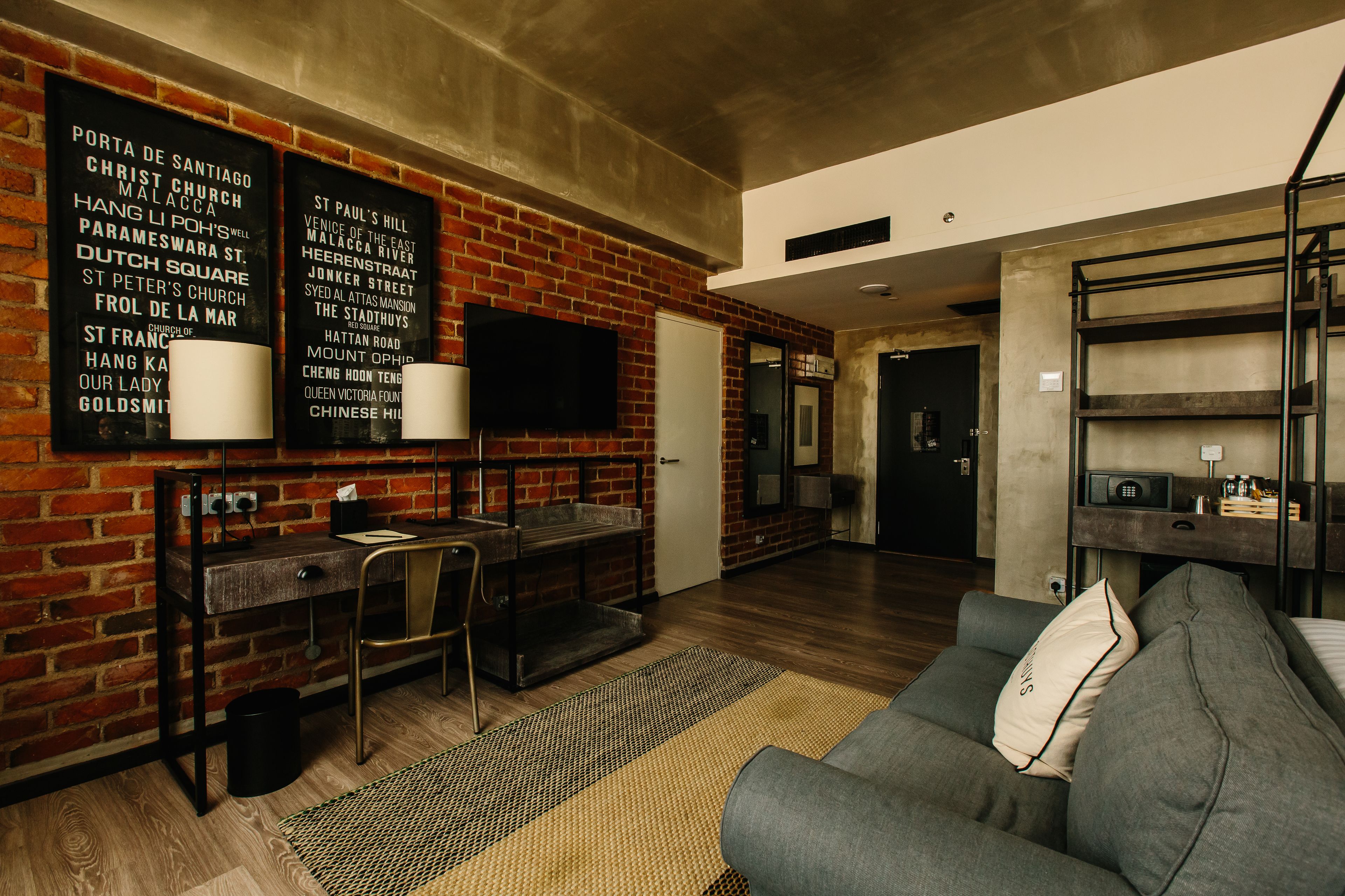 premier room, 1 king bed, city view | living area | 42-inch led tv with satellite channels, tv