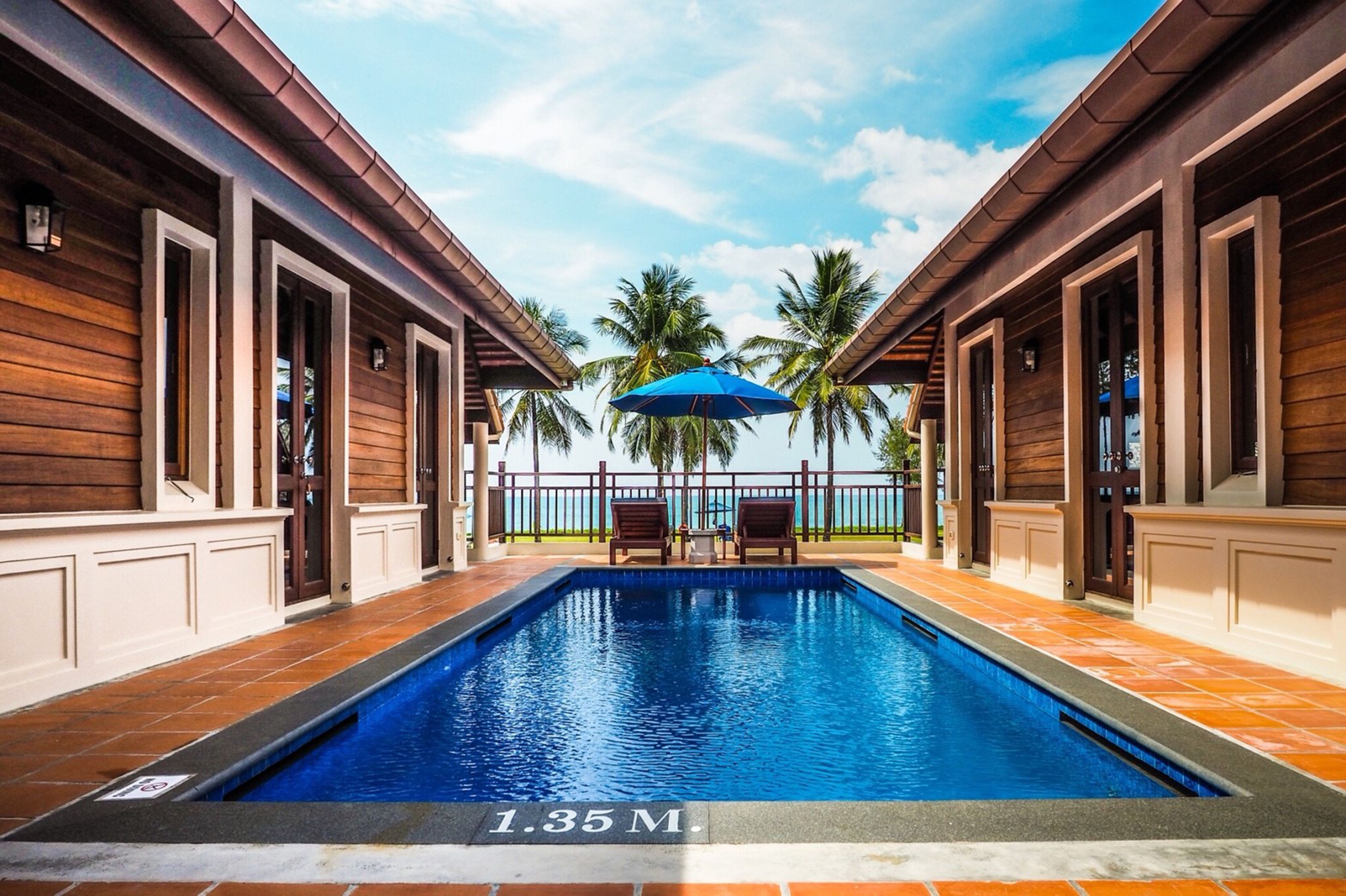 Outdoor pool, open 7 AM to 7 PM, pool umbrellas, sun loungers