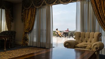 Premium Studio Suite | Living area | LED TV