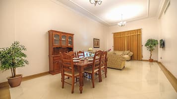 Apartment, 2 Bedrooms | Living area | 39-inch LED TV with satellite channels, TV