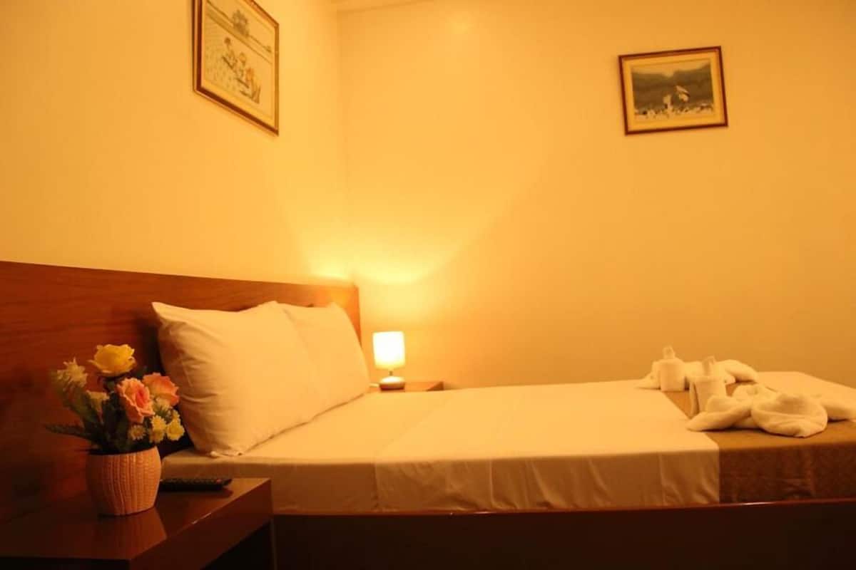 Deluxe Room, Multiple Beds | Desk, blackout drapes, iron/ironing board, free WiFi