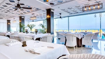Breakfast, lunch, dinner served; Mediterranean cuisine, beach views
