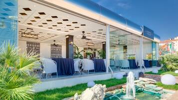 Breakfast, lunch, dinner served; Mediterranean cuisine, beach views