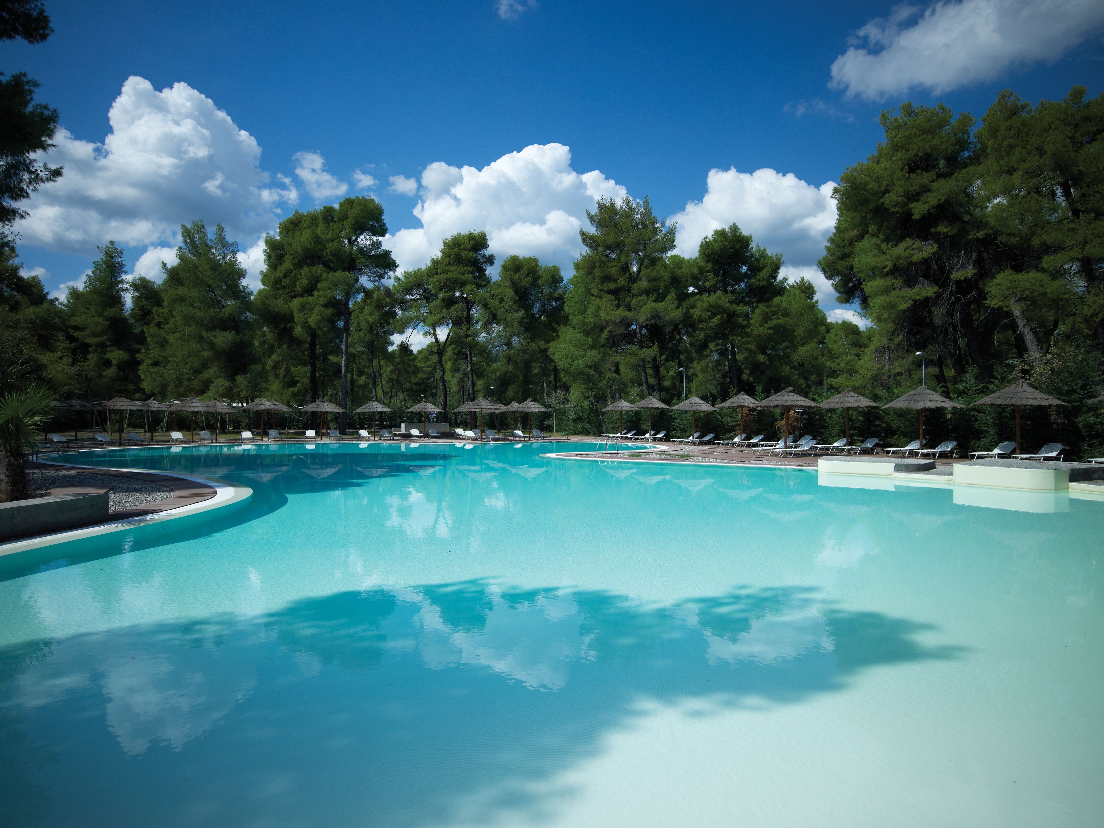 seasonal outdoor pool, pool umbrellas, pool loungers