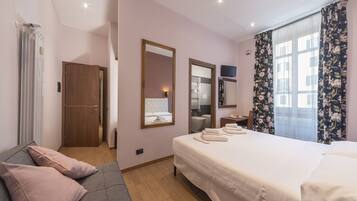 Standard Triple Room, Ensuite | In-room safe, desk, laptop workspace, iron/ironing board