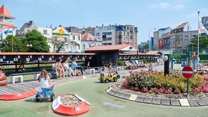 A children's play area with a track, benches, and a no-entry sign. - Hotel Franky (Blankenberge)
