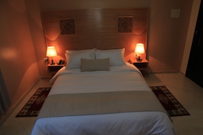 Desk, blackout drapes, soundproofing, free rollaway beds