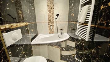 Royal Studio Suite, 1 Bedroom, City View | Bathroom | Free toiletries, hair dryer, towels, toilet paper