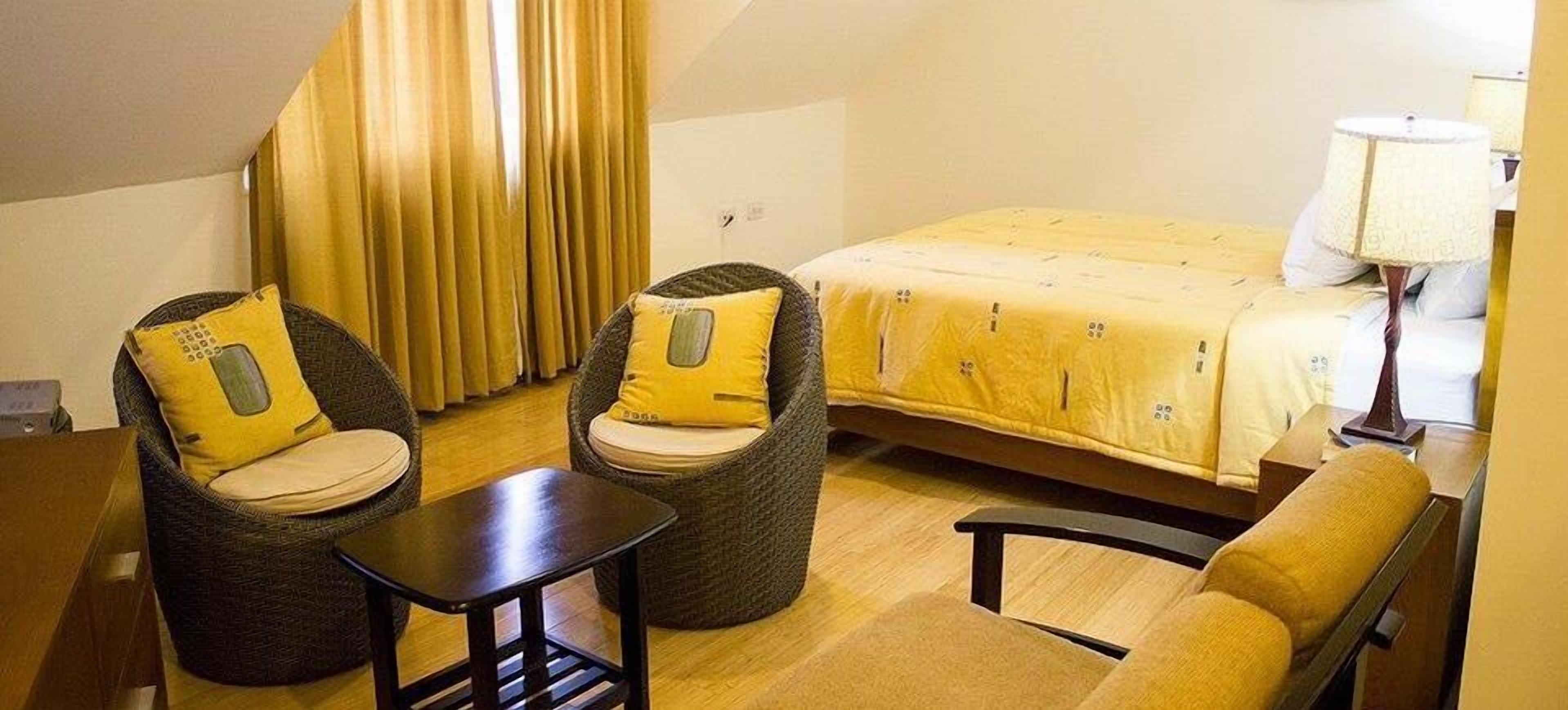 junior suite, 1 bedroom, mountain view | in-room safe, desk, iron/ironing board, free wifi