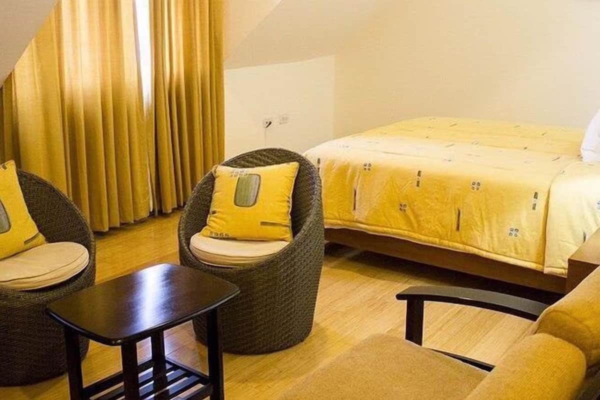 junior suite, 1 bedroom, mountain view | in-room safe, desk, iron/ironing board, free wifi