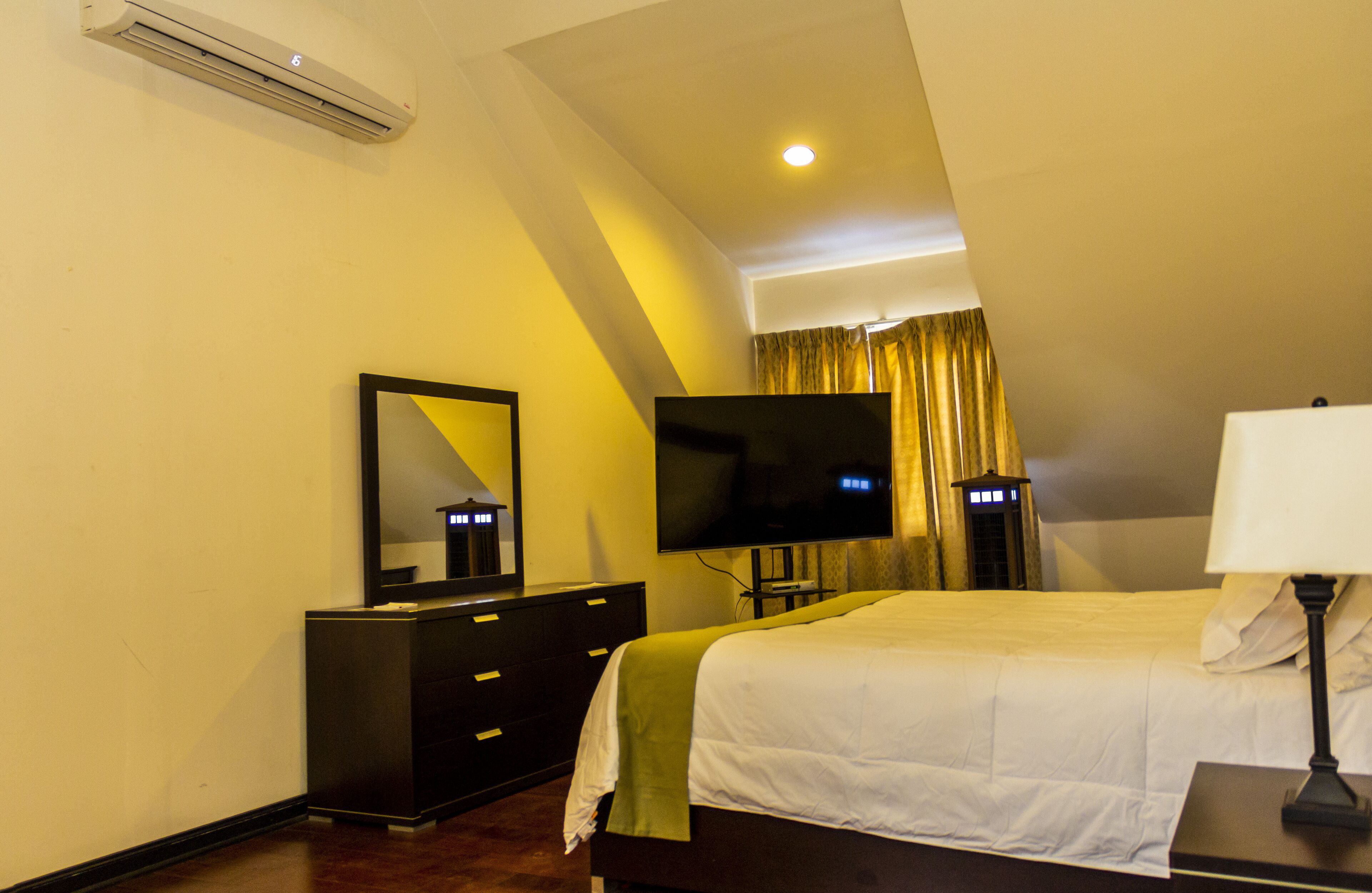 junior suite, 1 bedroom, mountain view | in-room safe, desk, iron/ironing board, free wifi