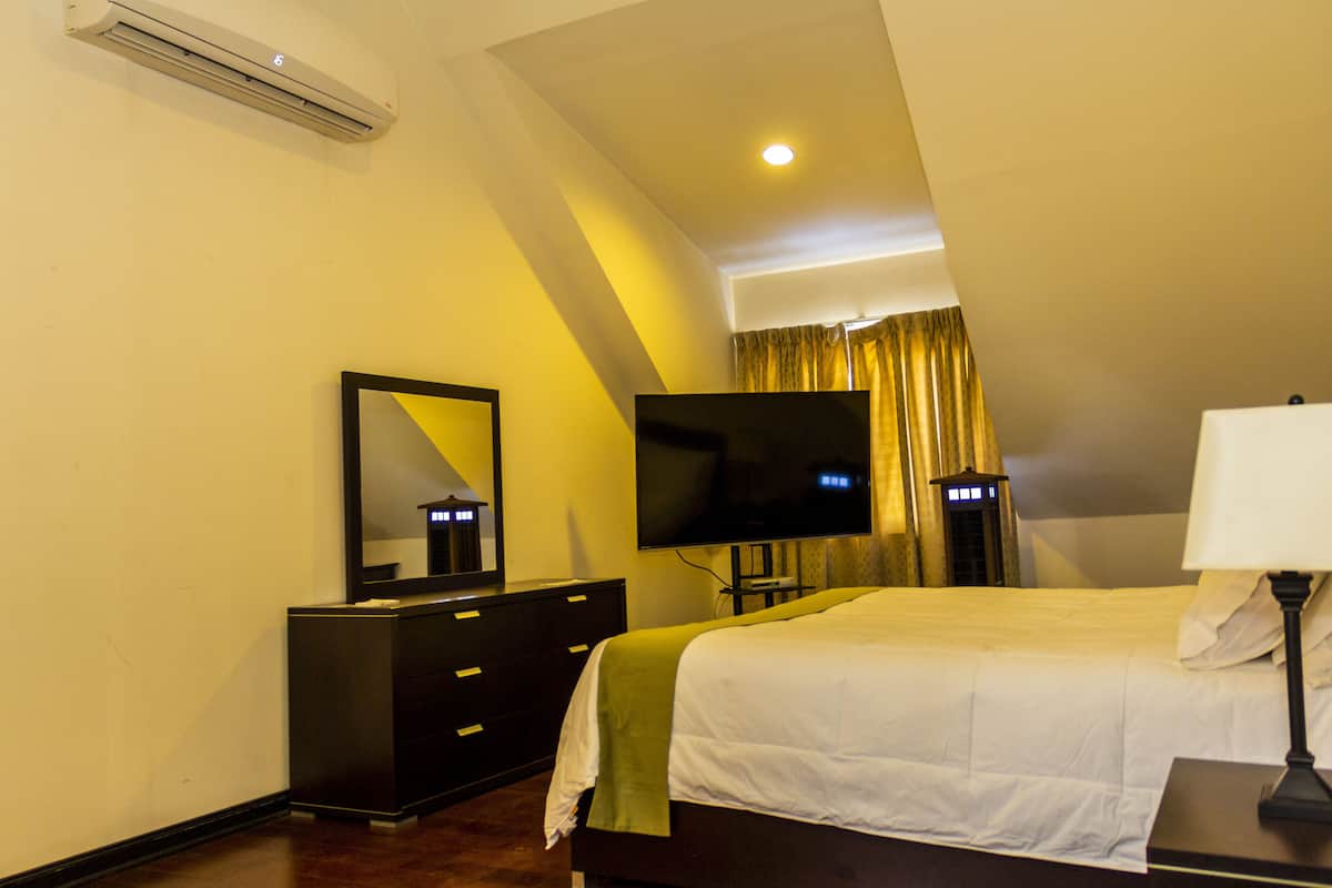 junior suite, 1 bedroom, mountain view | in-room safe, desk, iron/ironing board, free wifi