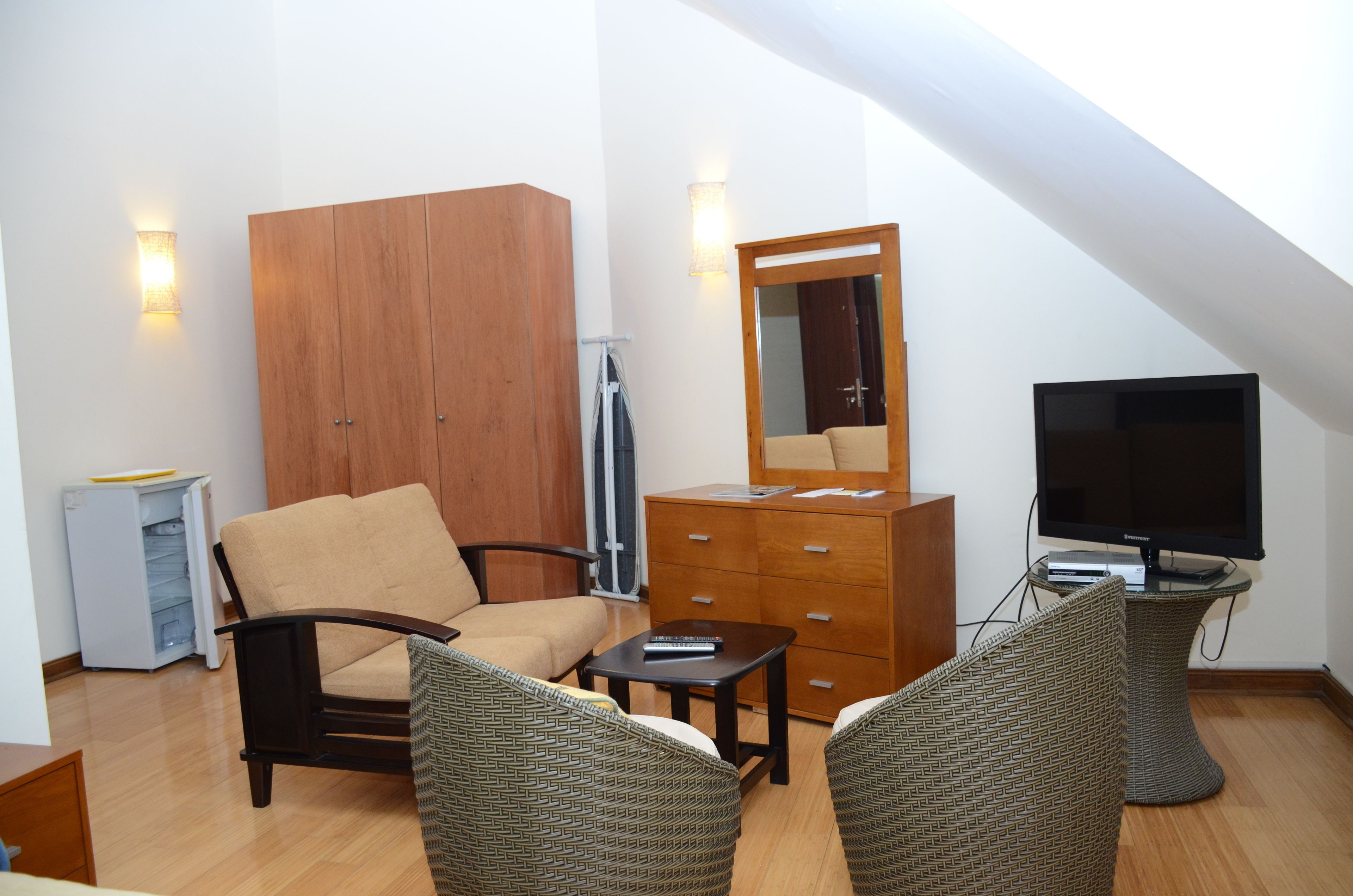 junior suite, 1 bedroom, mountain view | living area | flat-screen tv