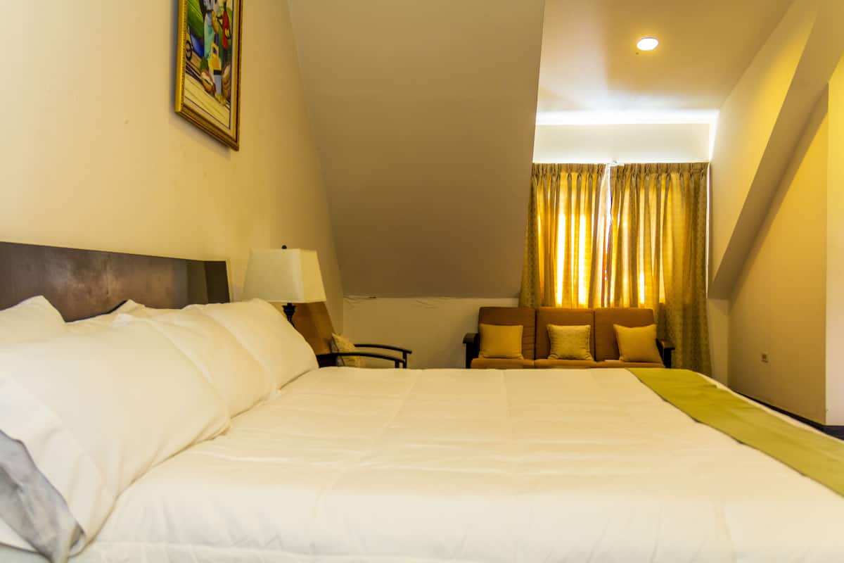 junior suite, 1 bedroom, mountain view | living area | flat-screen tv