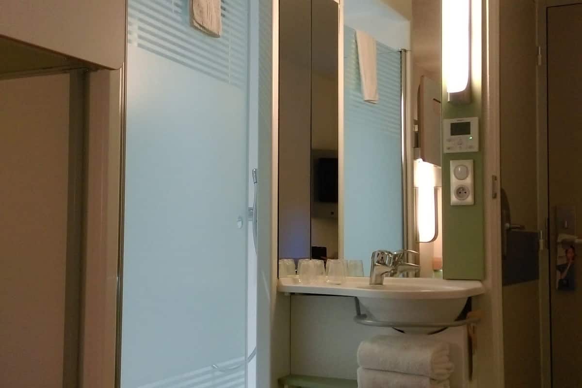 shower, eco-friendly toiletries, towels