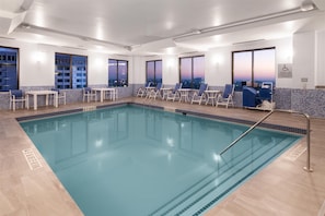Indoor pool, open 9:00 AM to 10:00 PM, pool loungers