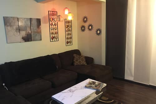 Luxury Apartment, 1 Bedroom, Non Smoking, Refrigerator & Microwave | Living area | Flat-screen TV, Netflix
