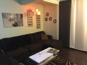 Appartement Luxe, 1 chambre, non-fumeur, réfrigérateur et four à micro-ondes | Coin séjour