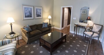 Suíte executiva, 1 quarto | Área de estar