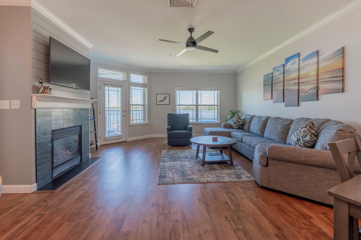 Premier Suite, 2 Bedrooms, Lake View | Living area | TV, fireplace