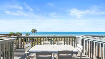 Casa adossada, 3 dormitoris, primera línia de platja (Beachside West 5) | Terrassa o pati