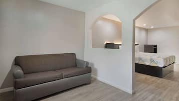 Deluxe Suite, 1 King Bed, Non Smoking, Refrigerator & Microwave | Desk, iron/ironing board