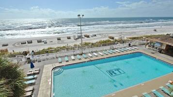 Seasonal outdoor pool, pool loungers