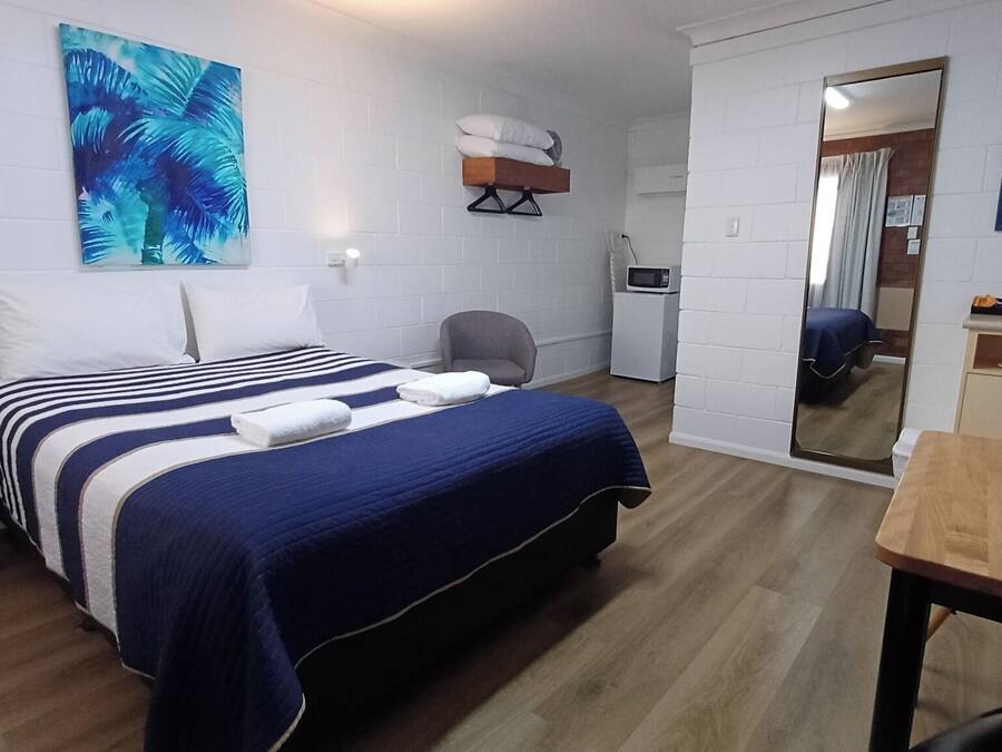 Standard Double Room, 1 King Bed, Refrigerator & Microwave, Ground Floor | Memory-foam beds, individually decorated, desk, blackout curtains