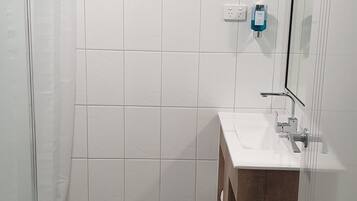 Shower, free toiletries, hair dryer, towels
