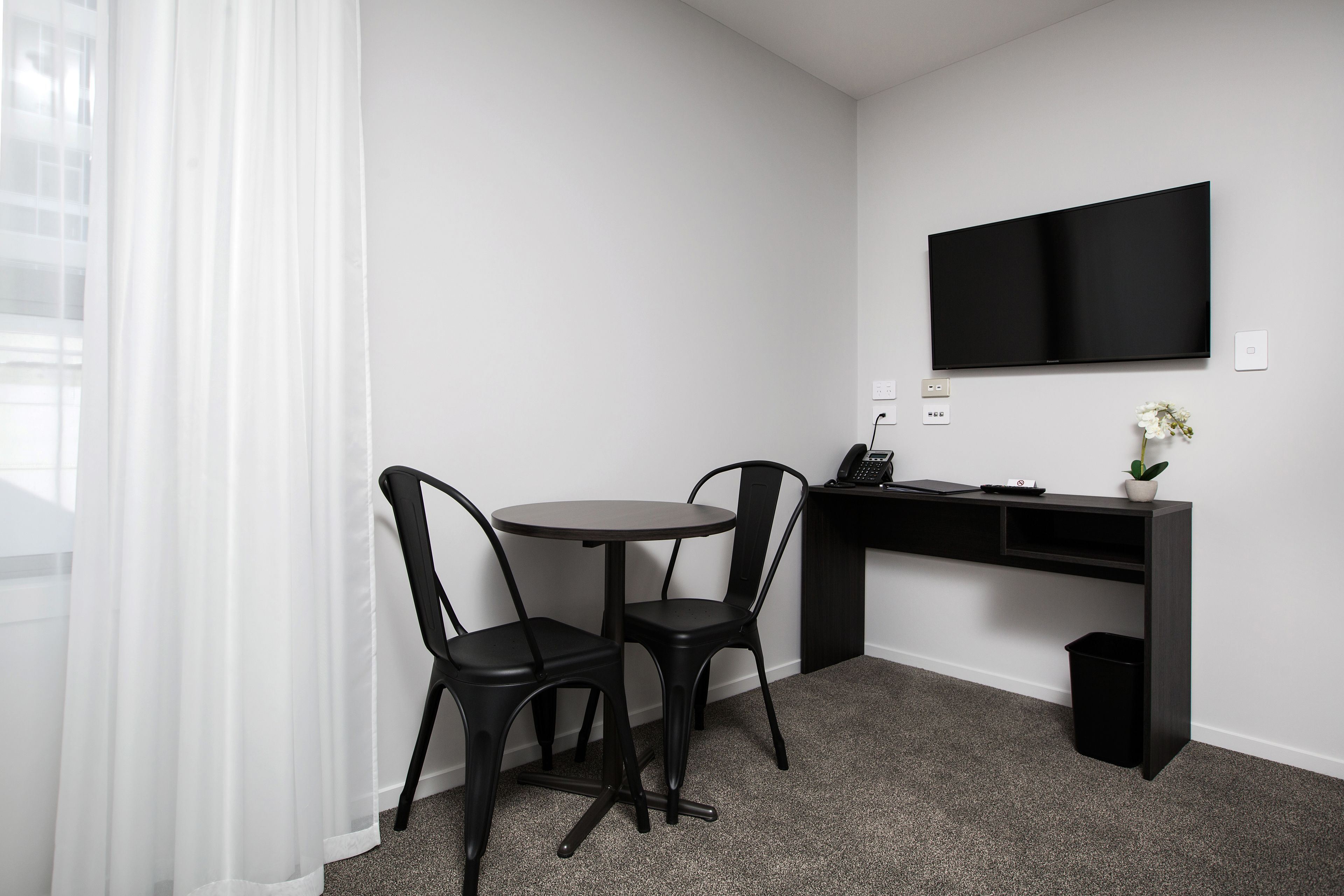 compact studio | premium bedding, individually decorated, individually furnished, desk