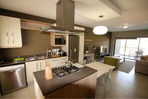 2 Bedroom Delux Apartment | Private kitchen | Full-size fridge, microwave, oven, stovetop - The Hub (Sandton)