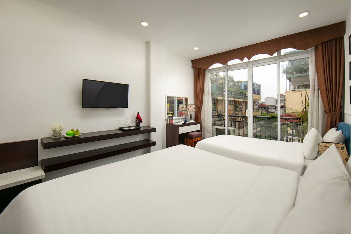 family suite, balcony | 1 bedroom, premium bedding, minibar, in-room safe