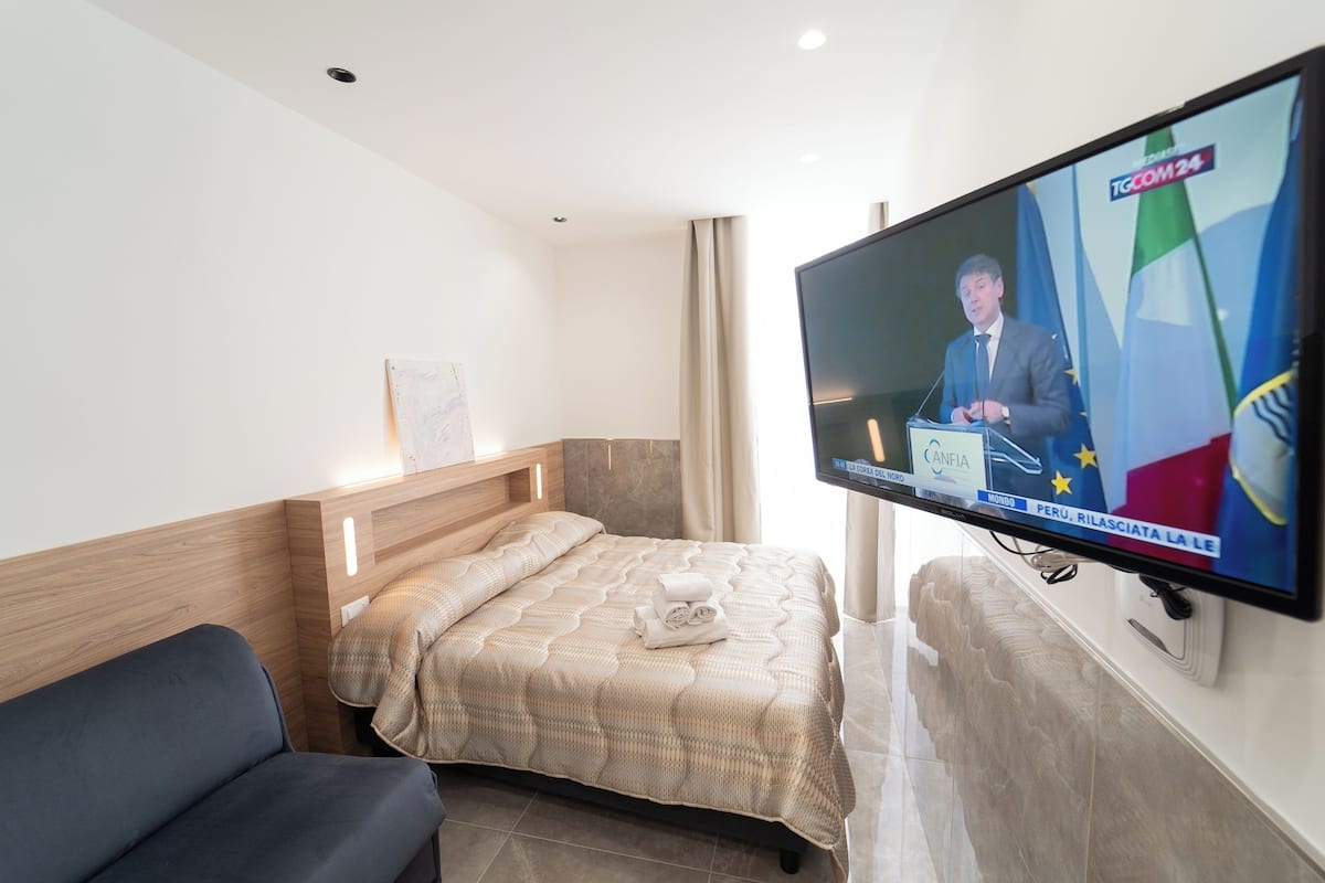 Luksus-studiosuite, byutsikt, anneks (Vico Giardinetto 84) | Italienske Frette-laken, sengetøy av topp kvalitet og dundyner