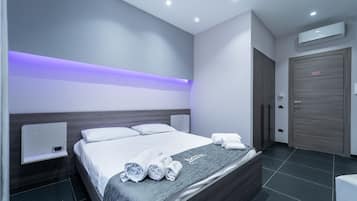 Frette Italian sheets, premium bedding, down comforters